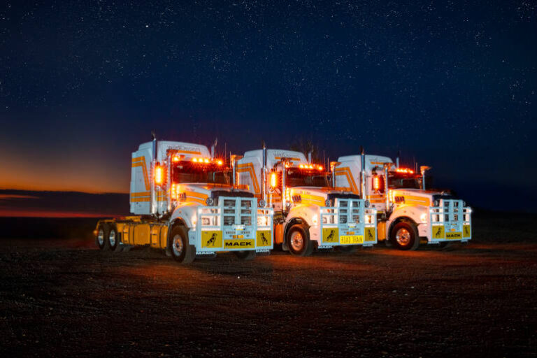 Wild Desert Mack Titan truck road train at night